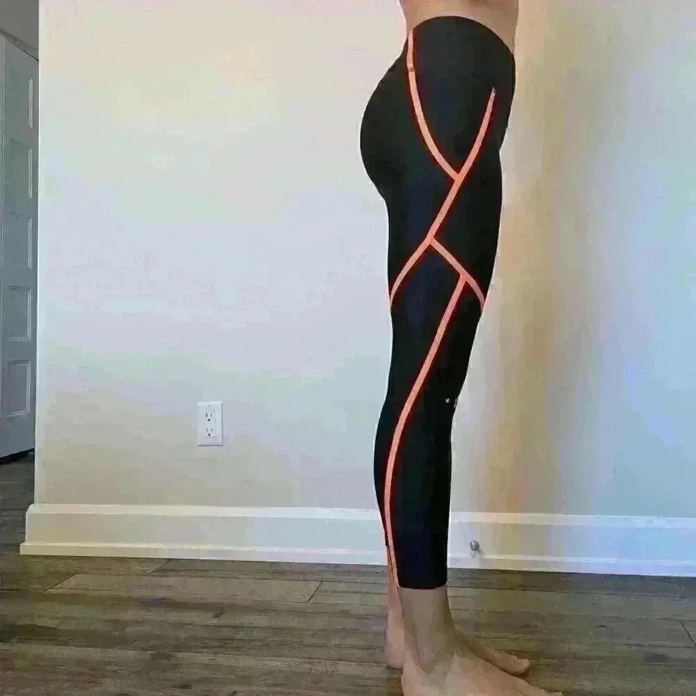 Under Armour, 7/8 Leggins, Mid-rise , Black and orange, Size  Small